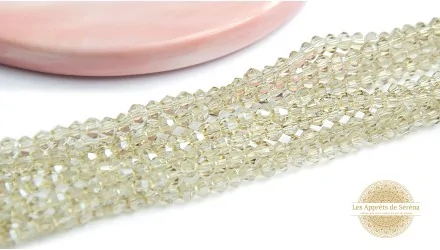 Perles toupies à facettes 3x3.5mm champagne